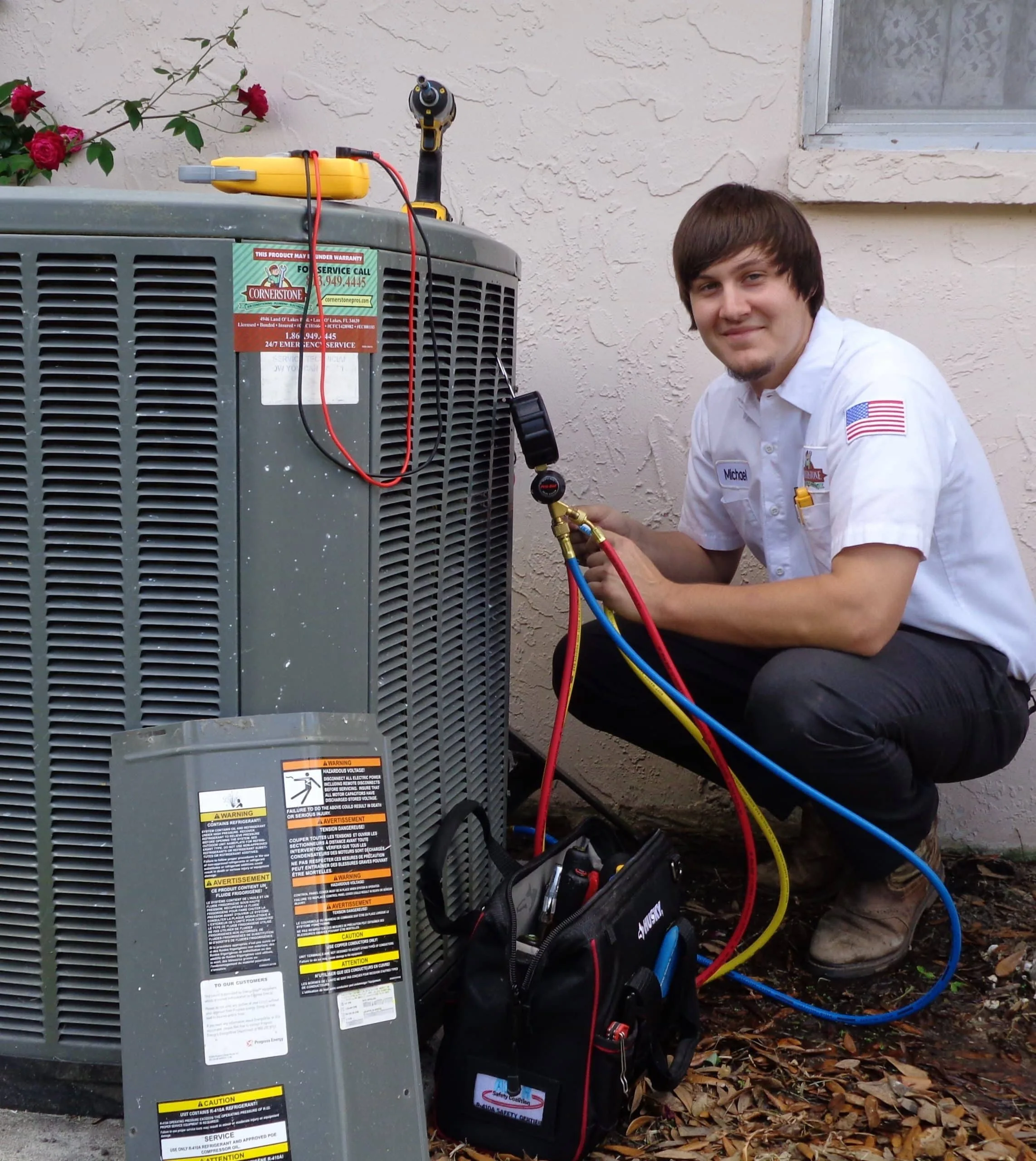 man fixing equipment