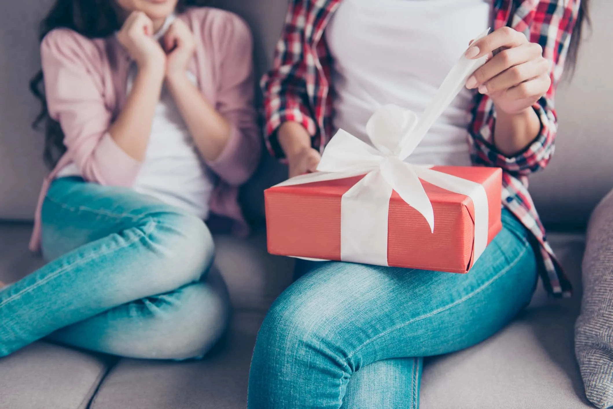 woman unwrapping present